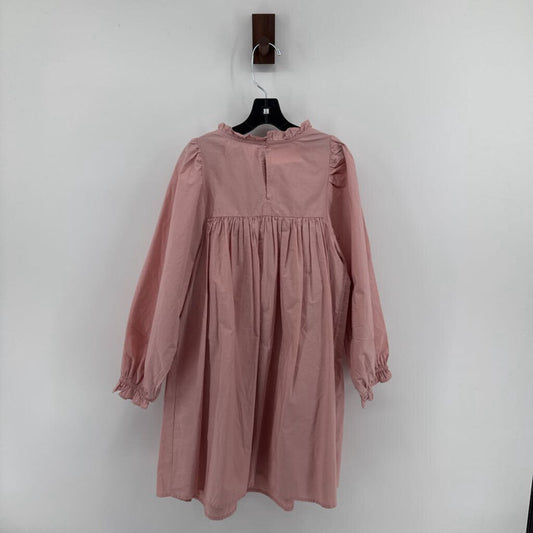 Pink smocked long sleeved