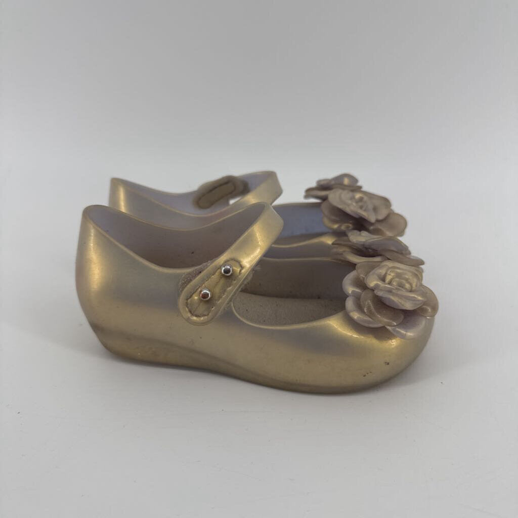flowers on the toes, jelly shoes
