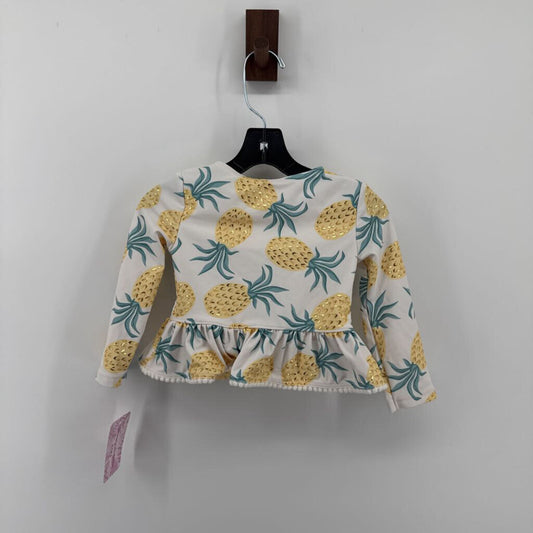 Tags on, pineapples
