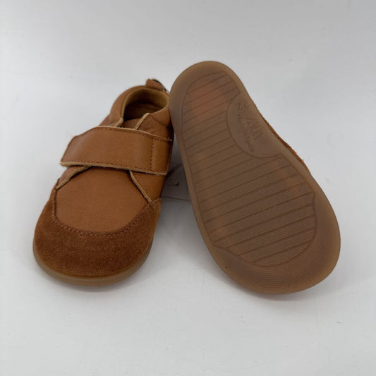 Tags on, velcro strap
