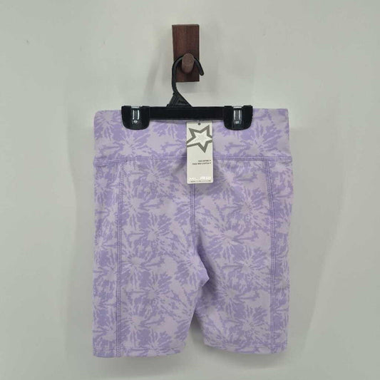 Tags on, spandex shorts