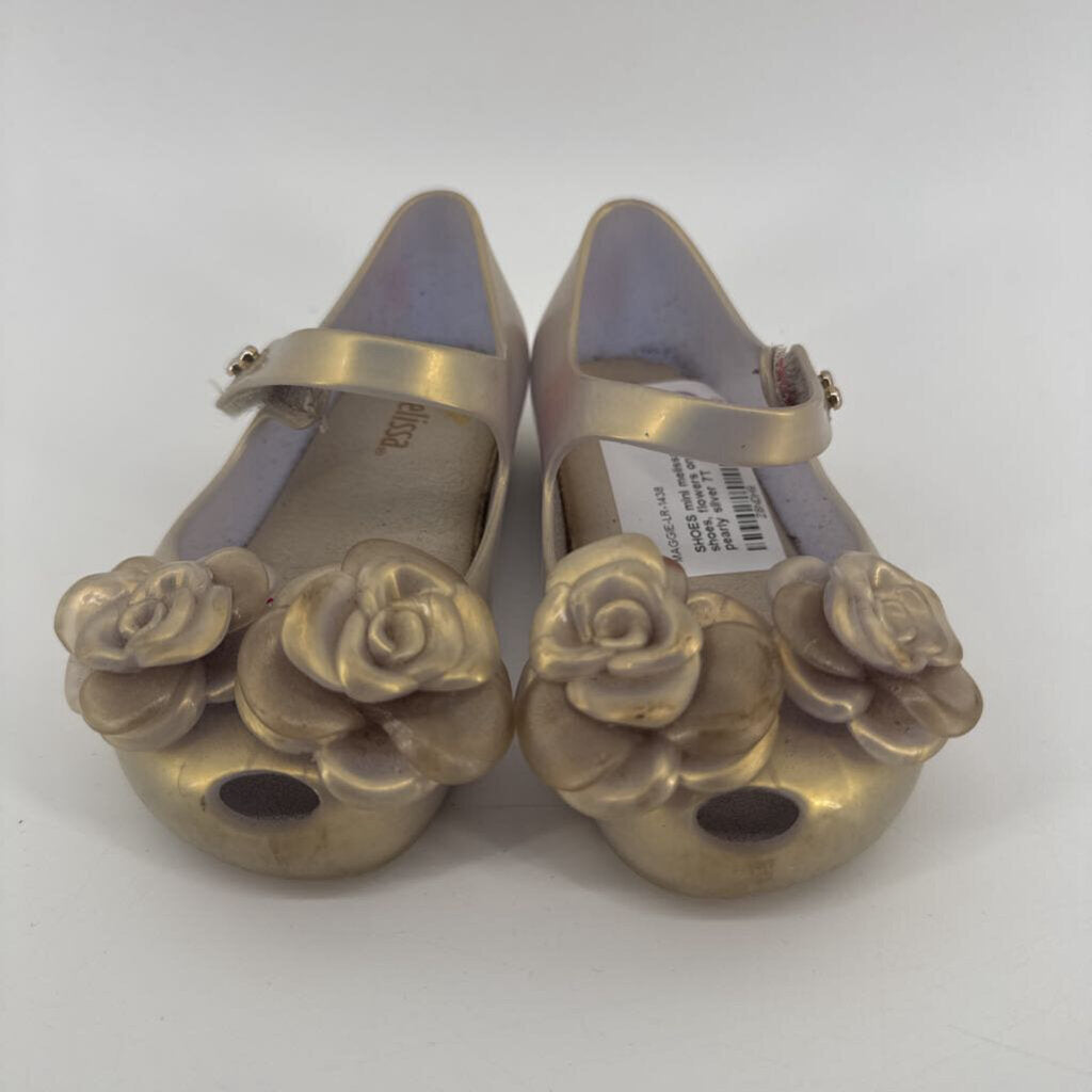 flowers on the toes, jelly shoes