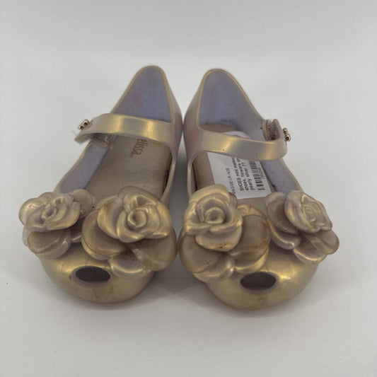 flowers on the toes, jelly shoes