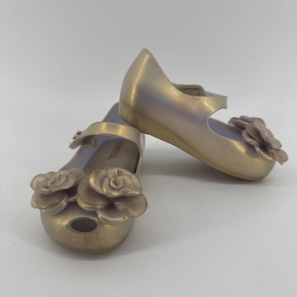 flowers on the toes, jelly shoes