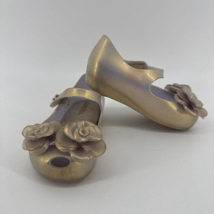 flowers on the toes, jelly shoes