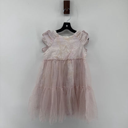 Sparkly tulle, butterfly wings on the back