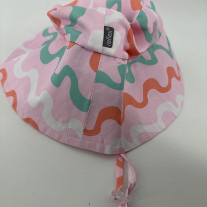 Tags on, comes with hat