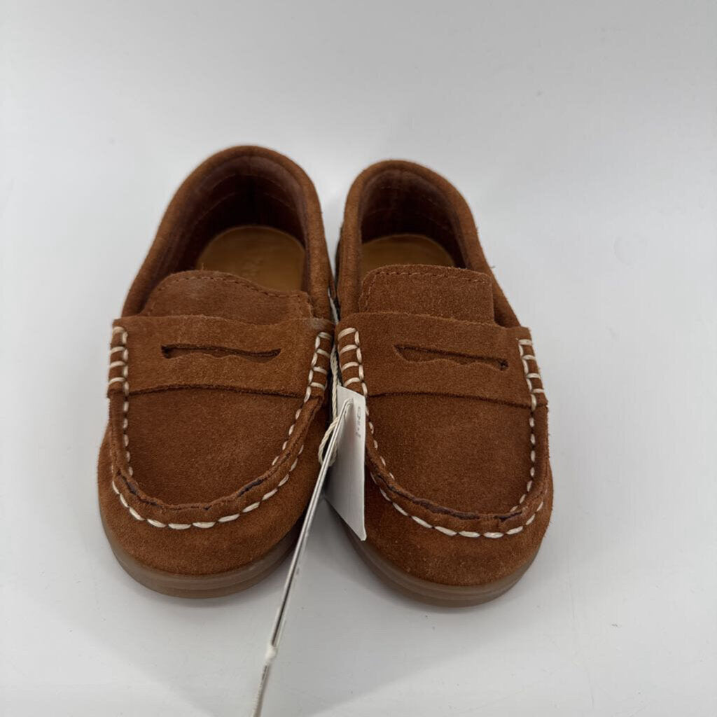Tags on, moccasins