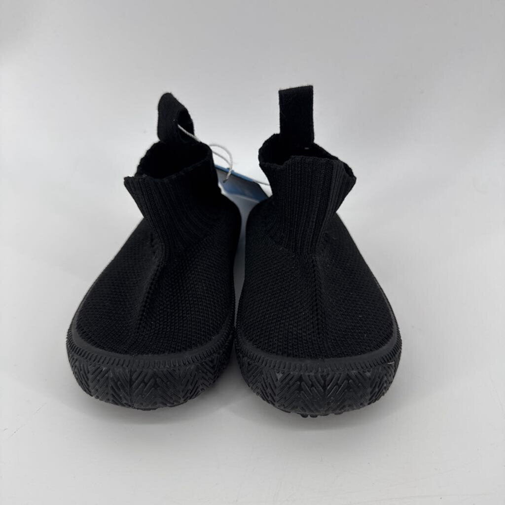 Tags on, knit shoe