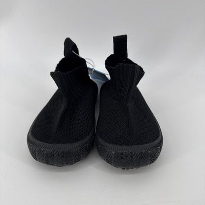 Tags on, knit shoe