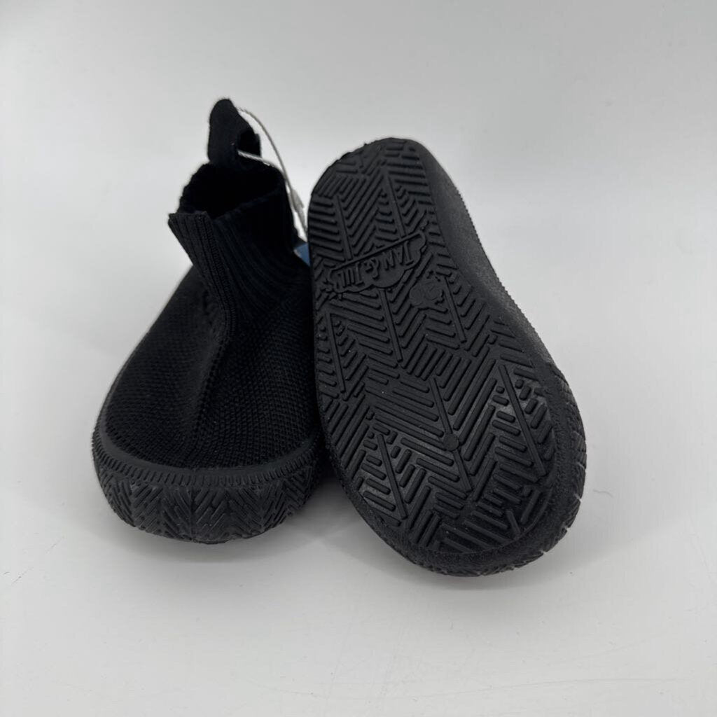 Tags on, knit shoe