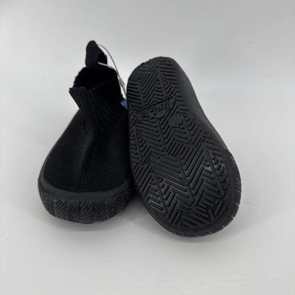 Tags on, knit shoe