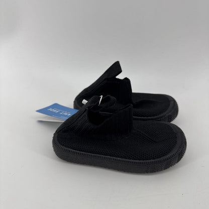Tags on, knit shoe