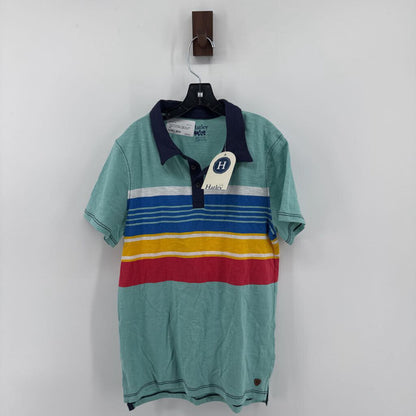 Tags on, polo t-shirt and chino pants