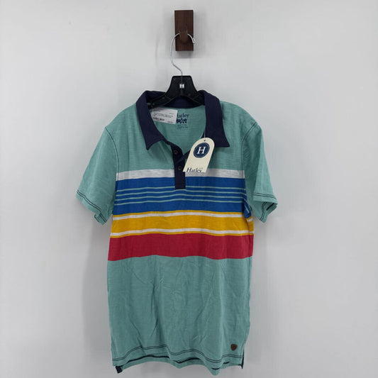Tags on, polo t-shirt and chino pants