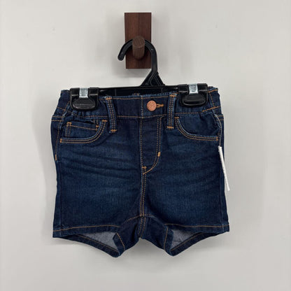 Tags on, denim