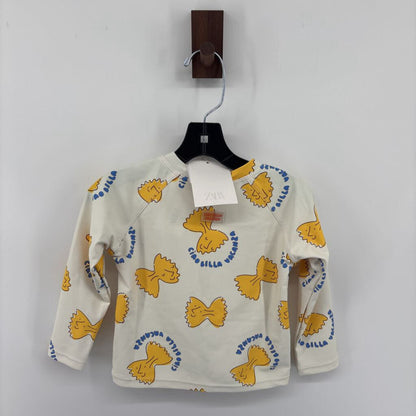 Tags on, rash guard