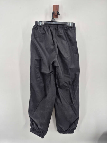 Tags on, rain pants