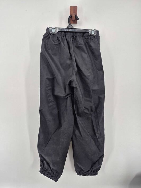 Tags on, rain pants