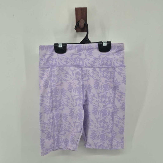 Tags on, spandex shorts