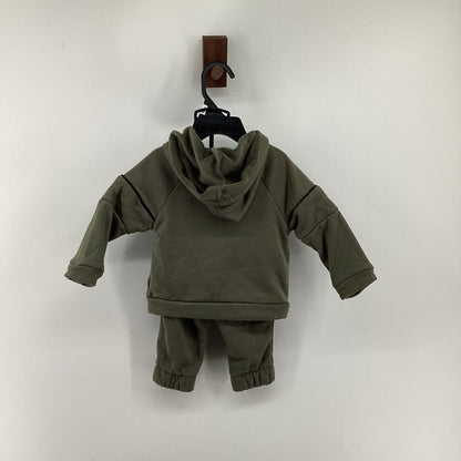 Tags on, sweatsuit